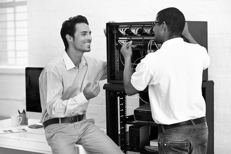 technician-discussing-server
